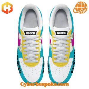 Top view of custom New Kids on the Block Nike Air Force 1 sneakers showing colorful design and "BLOCK" text on tongue.