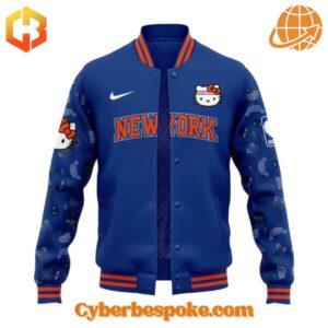 Front view of New York Knicks Hello Kitty Night Baseball Jacket in blue with orange accents.