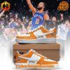 Close-up of New York Knicks Limited Edition Nike Air Force Shoes in orange and white.