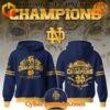 Notre Dame Fighting Irish Orange Bowl Champions 2025 Hoodie in navy blue with team logo and championship text.