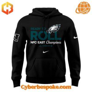 Front view of Philadelphia Eagles 2024 NFC East Champions black hoodie.