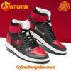 Tampa Bay Buccaneers-themed Air Jordan 1 sneakers with custom graphics and colors.