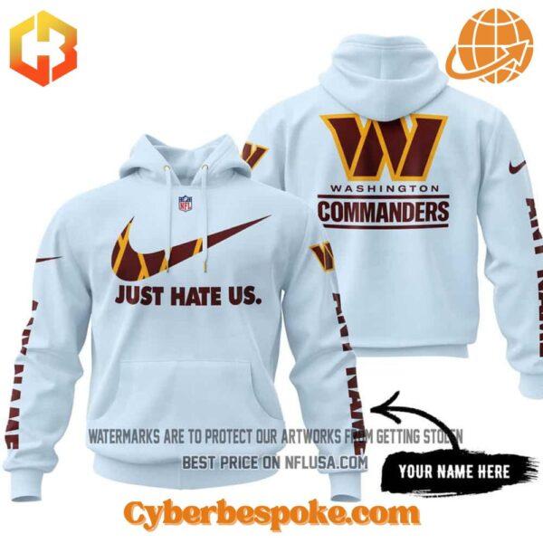 Front view of the Washington Commanders Just Hate Us Limited Edition Hoodie featuring unique text and logo