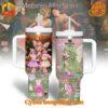 Two 40oz tumblers with handles displaying colorful Melanie Martinez-inspired artwork, including fairy characters and whimsical symbols.