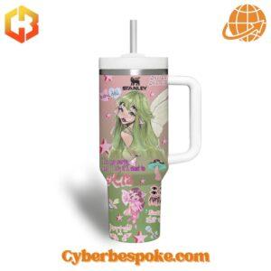 Two 40oz tumblers with handles displaying colorful Melanie Martinez-inspired artwork, including fairy characters and whimsical symbols.